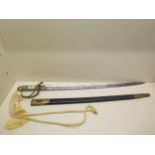 A military sword with brass hilt and grip - Total length 81cm with leather and brass scabbard -