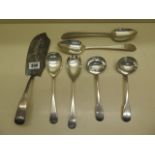 A pair of silver serving spoons, a pair of silver ladles, two silver servers and a silver slice -
