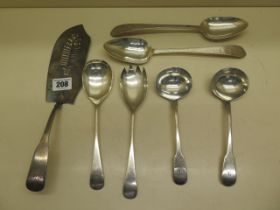 A pair of silver serving spoons, a pair of silver ladles, two silver servers and a silver slice -