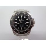 A 2014 Rolex Oyster Perpetual Submariner stainless steel bracelet gentleman's watch with black