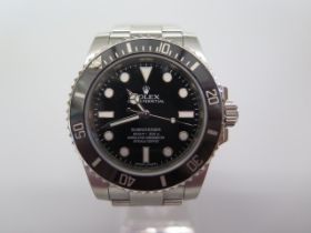 A 2014 Rolex Oyster Perpetual Submariner stainless steel bracelet gentleman's watch with black