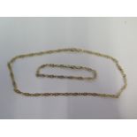 A 9ct yellow gold 41cm chain and a matching 19cm bracelet - total weight approx 9.8 grams - clasps