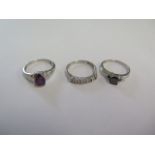 A 9ct white gold black diamond ring size N/O and two other 9ct white gold rings - total weight