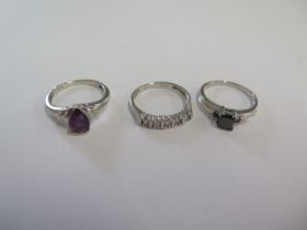 A 9ct white gold black diamond ring size N/O and two other 9ct white gold rings - total weight