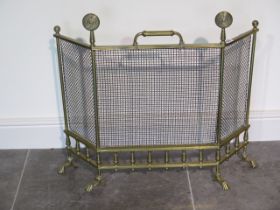 A brass fire guard - Height 63cm x Width 68cm - generally good, handle loose