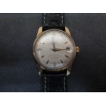 An Allaine automatic gents wristwatch with date on a leather strap - in working order