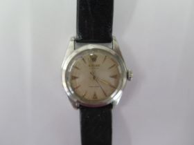 A Rolex stainless steel Oyster precision manual wind gents wristwatch on a leather strap model