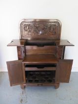 A carved Chinese drinks cabinet with a fitted interior - Height 98cm x 84cm x 40cm