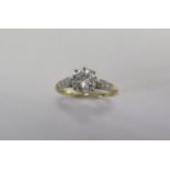 A yellow gold diamond solitaire ring - The central 1ct brilliant cut diamond approx 6.8mm x 3.