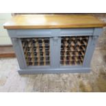 A shabby chic painted 40 bottle wine rack with polished pine top and two drawers - Height 85cm x