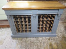 A shabby chic painted 40 bottle wine rack with polished pine top and two drawers - Height 85cm x