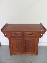 A 20th century Chinese carved alter type cabinet - Height 80cm x Width 93cm x Depth 40cm