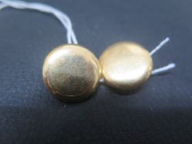 A pair of 18ct yellow gold round clip earrings - approx 1.7cm diameter - weight approx 9 grams