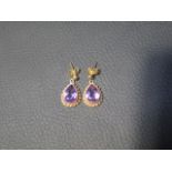 A pair of 9ct yellow gold and amethyst drop earrings - approx 1.8cm - weight approx 2.7 grams