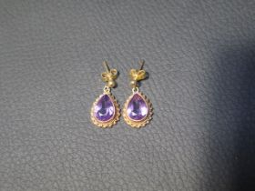 A pair of 9ct yellow gold and amethyst drop earrings - approx 1.8cm - weight approx 2.7 grams