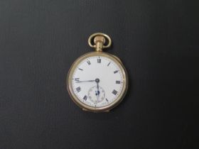 A 10ct yellow gold plated double cased pocket watch - working, in good condition - approx 5cm -