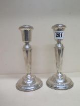 A pair of silver candlesticks, Birmingham 1979 - approx weight 18cm