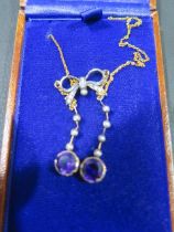 A vintage style bow top necklace set with amethysts, diamonds and seed pearls - boxed - clasp