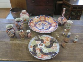 A mixed lot of Oriental ceramics - Two Imari chargers approx 42cm and 32cm (with four character