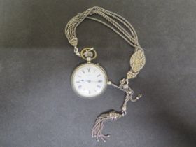 A Russells silver cased fob watch approx 4cm - together with a good silver watch chain