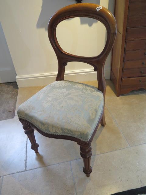 A Victorian mahogany balloon back dining chair