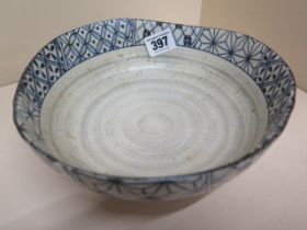 A Japanese/Chinese blue and white bowl of irregular size