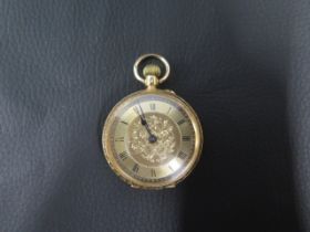 An 18ct yellow gold cased fob watch, finely engraved case - approx 33mm