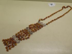 An amber necklace - approx weight 57 grams