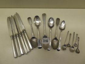 Assorted silver spoons - weight approx 5.1 troy oz and a set of six silver handled knives