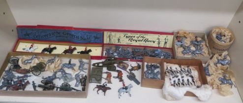 A quantity of early 20th century lead toy soldiers with accessories including some original boxes