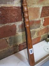 A wooden truncheon Gongo Alvez