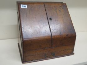 An oak writing box with internal calendar etc - approx 30cm x 29cm x 22cm