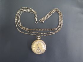 An 18ct gold pocket watch with its key and case - Not working - and a gold plated chain