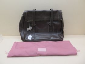 A Radley leather handbag with matching protective bag