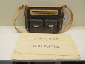 A Louis Vuitton leather handbag complete with original protective bag - in nearly new condition
