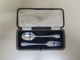 A silver christening for and spoons set in original fitted box - Munsey & Co Ltd, Cambridge -