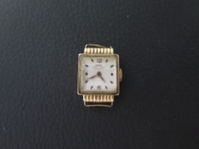 A 1940's/50's ladies 18ct yellow gold cased Ramex wristwatch - seen working - rectangular case