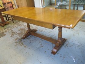 A good quality Stewart Linford oak draw leaf table with one leaf - 200cm x 80cm extended