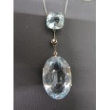 A good Art Deco aquamarine pendant on chain - The cushion shaped aquamarine approx 1.5cm x 1.5cm