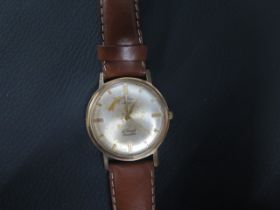 A gents 9ct yellow gold case Rotary wristwatch - round case approx 34mm - seen running - with