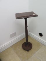 A mahogany stand with a round base and rectangular top - Height approx 75cm