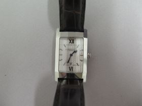 A gents Dunhill steel cased quartz wristwatch, rectangular case approx 35mm x 23mm - silver dial