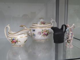 A Continental hand painted soft paste teapot and cream jug, mark to base - teapot approx 27cm, cream