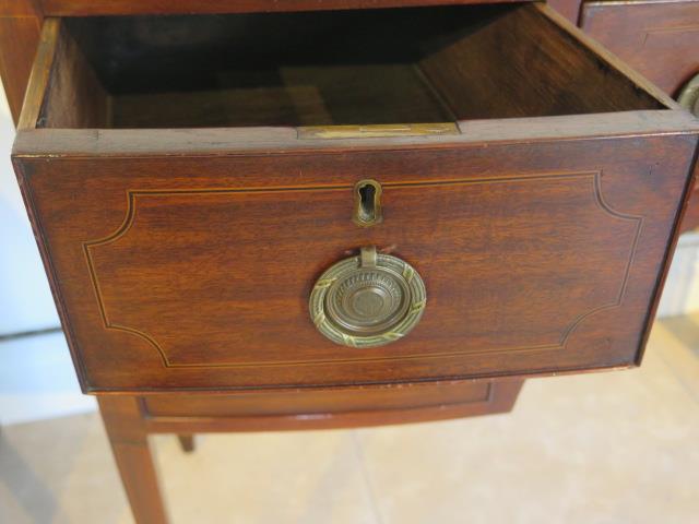 A Georgian mahogany and inlaid bow fronted Sheraton sideboard - in good condition with a good colour - Image 4 of 4