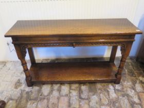 An oak hall table - Width 122cm x Height 71cm