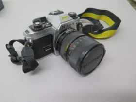 a Nikon SLR FG-20 with Soligor lense