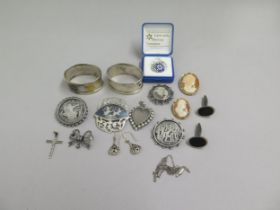 Silver jewellery including brooches, pendants, earrings, cufflinks and a pair of silver napkin rings