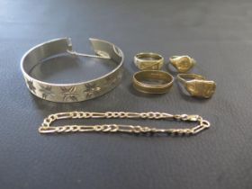 A selection of 9ct gold including two rings and bracelet - weight approx 11.5 grams with a silver