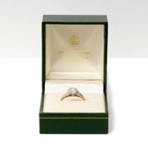 An 18ct yellow gold and diamond two stone crossover ring size R - weight approx 2.5 grams