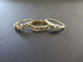 Three 9ct gold rings with diamonds - ring sizes K, K & L/M - total weight approx 6.3 grams